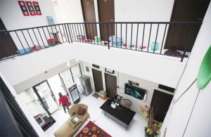 Communal living: The foyer of a boardinghouse in Kemanggisan, West Jakarta. Some owners are oblivious to the city rule requiring business registration. JP/ Ricky Yudhistira